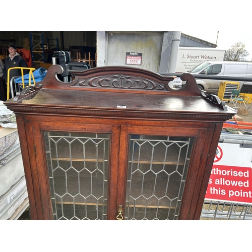 99 - A leaded glass cabinet 95x34x150