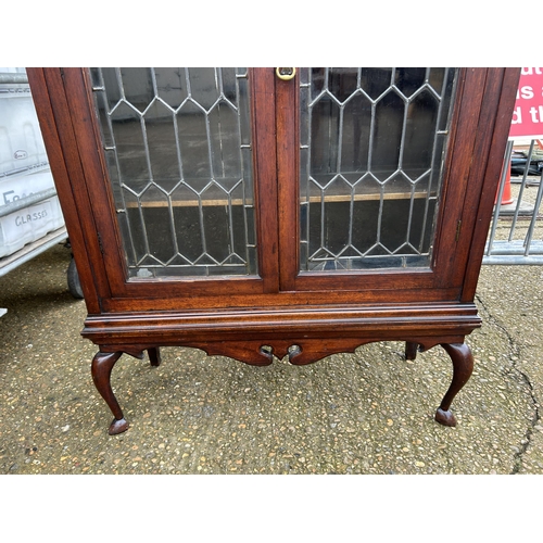 99 - A leaded glass cabinet 95x34x150