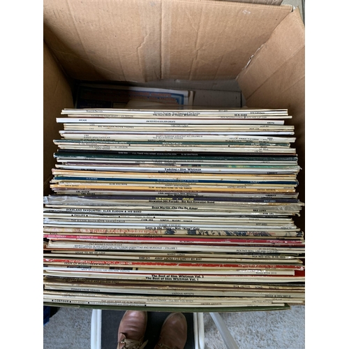 657 - 2 boxes of assorted records, including Slim Whitman and Elvis etc