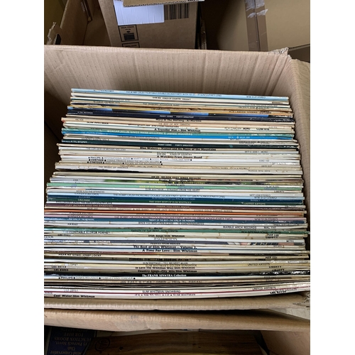 657 - 2 boxes of assorted records, including Slim Whitman and Elvis etc