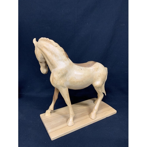 681 - Large Carved Wooden Horse figure, height 40 cms, length 39 cms