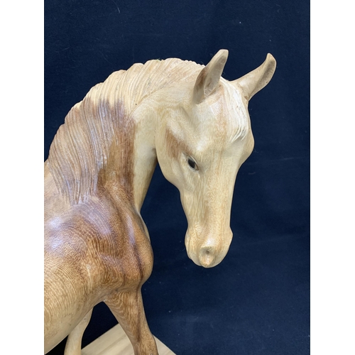 681 - Large Carved Wooden Horse figure, height 40 cms, length 39 cms