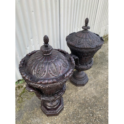 755 - 2 Grand carved wooden carpanular urns and covers, height 90cms, width 43cms