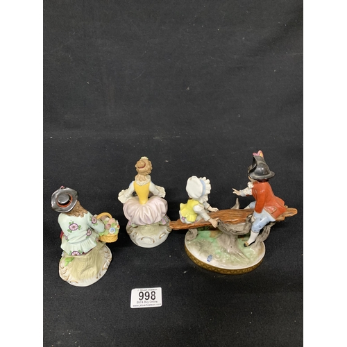 998 - Collection of seven decorative porcelain figures, tallest 21 cms