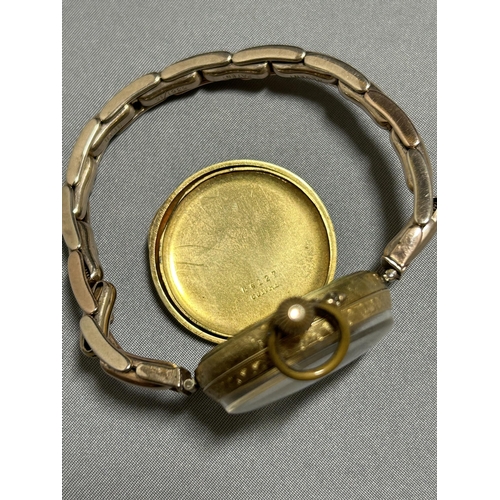 912 - French Hallmarked 14ct Gold Fob Watch mounted on 9ct Gold Bracelet, total gross weight 41.8 gms