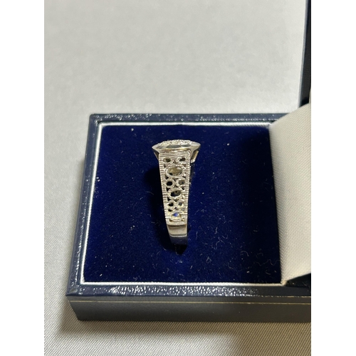 919 - 18ct White Gold Dress Ring, size L, marked 18ct, gross weight 4.8 gms, with box