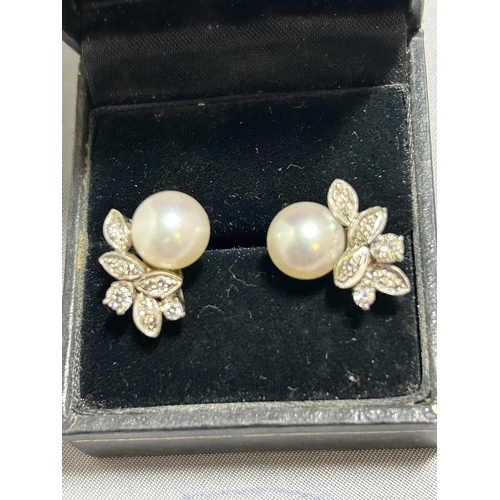 946 - Pair of White Gold Diamond and Pearl stud earrings, total weight 5.8 gms