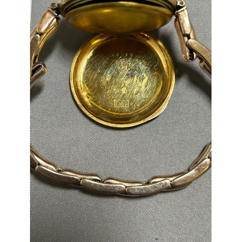 912 - French Hallmarked 14ct Gold Fob Watch mounted on 9ct Gold Bracelet, total gross weight 41.8 gms