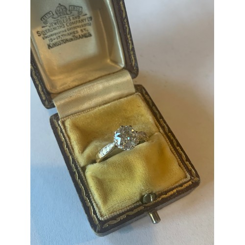 931 - A gold solitaire diamond ring, having a single old brilliant cut diamond in a claw setting with chen... 