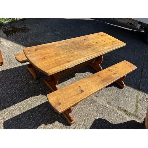 32 - A large pine refectory style dining table 185x65 together with pair of bench seats