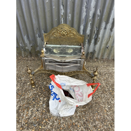 100 - A brass electric fire with bag of coals