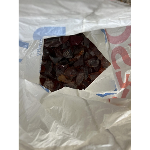 100 - A brass electric fire with bag of coals