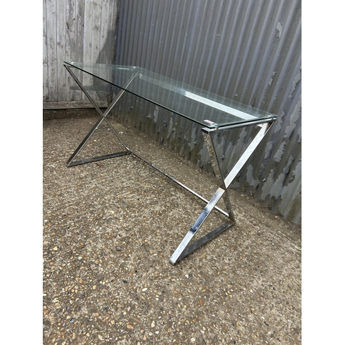 107 - A modern chrome and glass desk 120x60x77