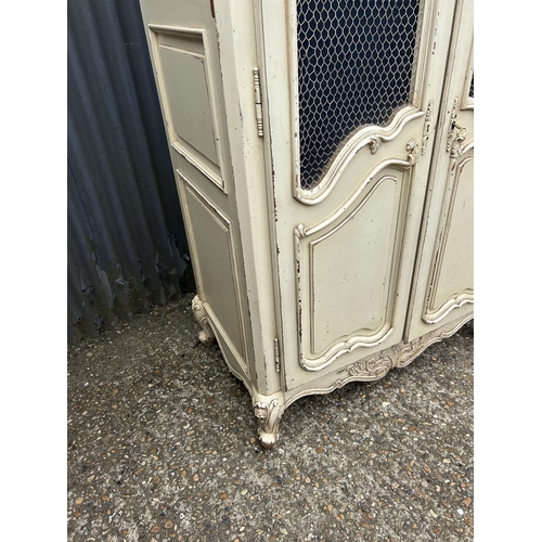 111 - A French style white painted armoire cupboard with part fitted interior  98x56x200