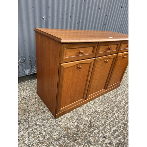 239 - A mid century teak three drawer sideboard 120x50x77
