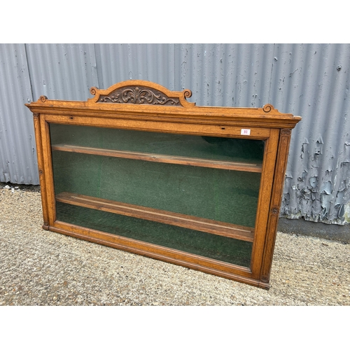 80 - A Victorian oak wall mounted display case 153x84