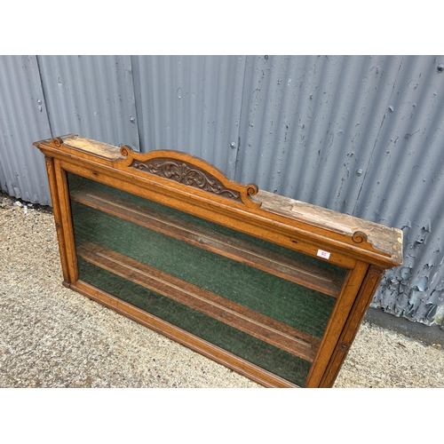 80 - A Victorian oak wall mounted display case 153x84