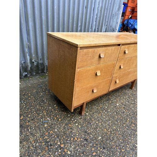 22 - A retro light oak lowboy chest of drawers 120x42x70