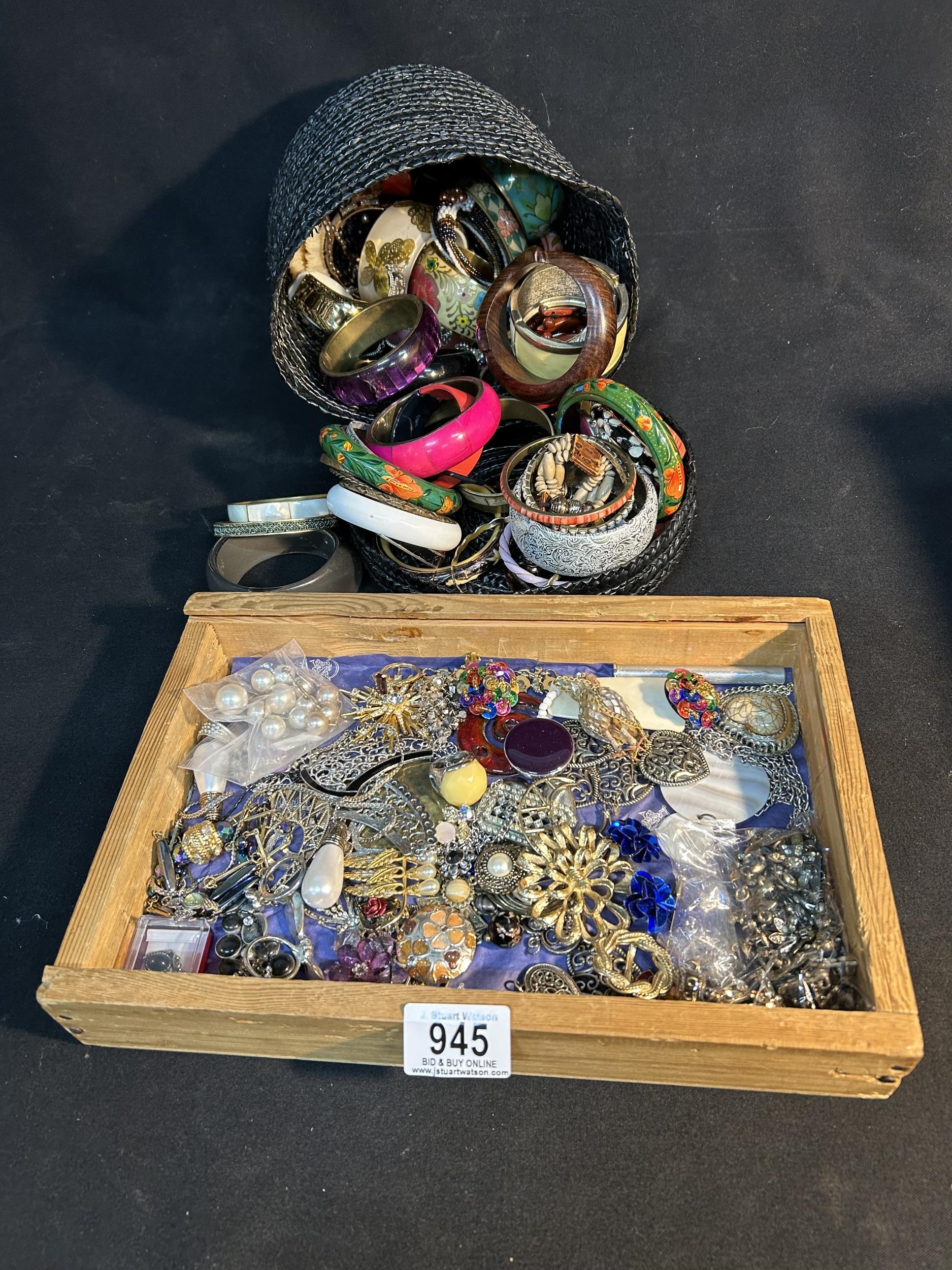 Basket of bangles and tray of costume jewellery