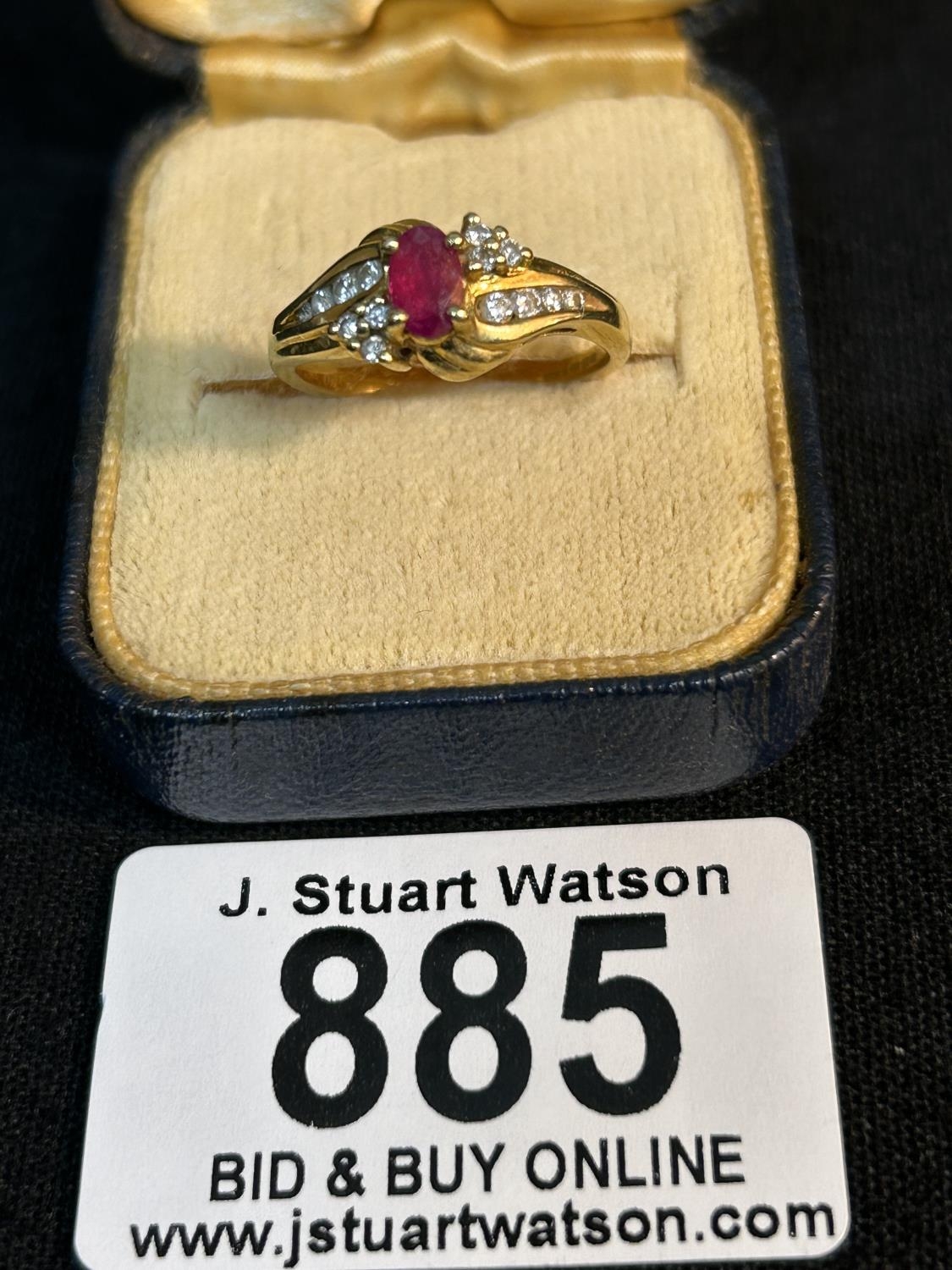 Gold: Hallmarked 18ct Ruby & Diamond Ring and marked 18KT 0.23, size N ...