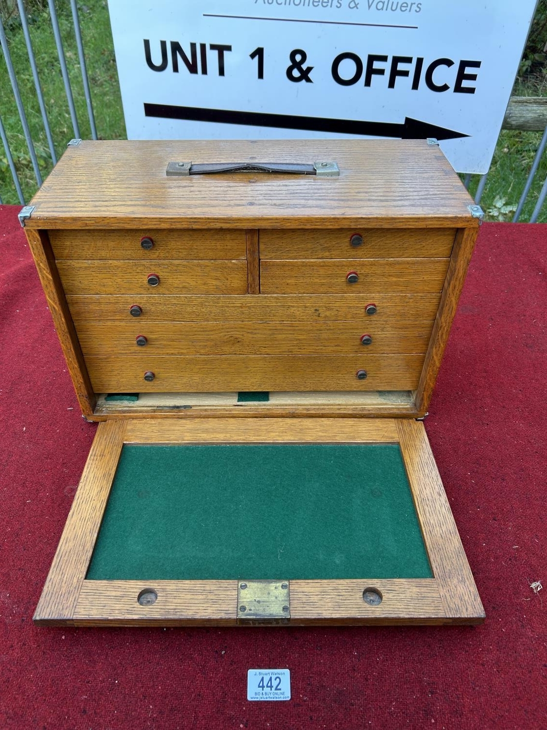 Oak engineers cabinet together with precision engineering tools, and ...