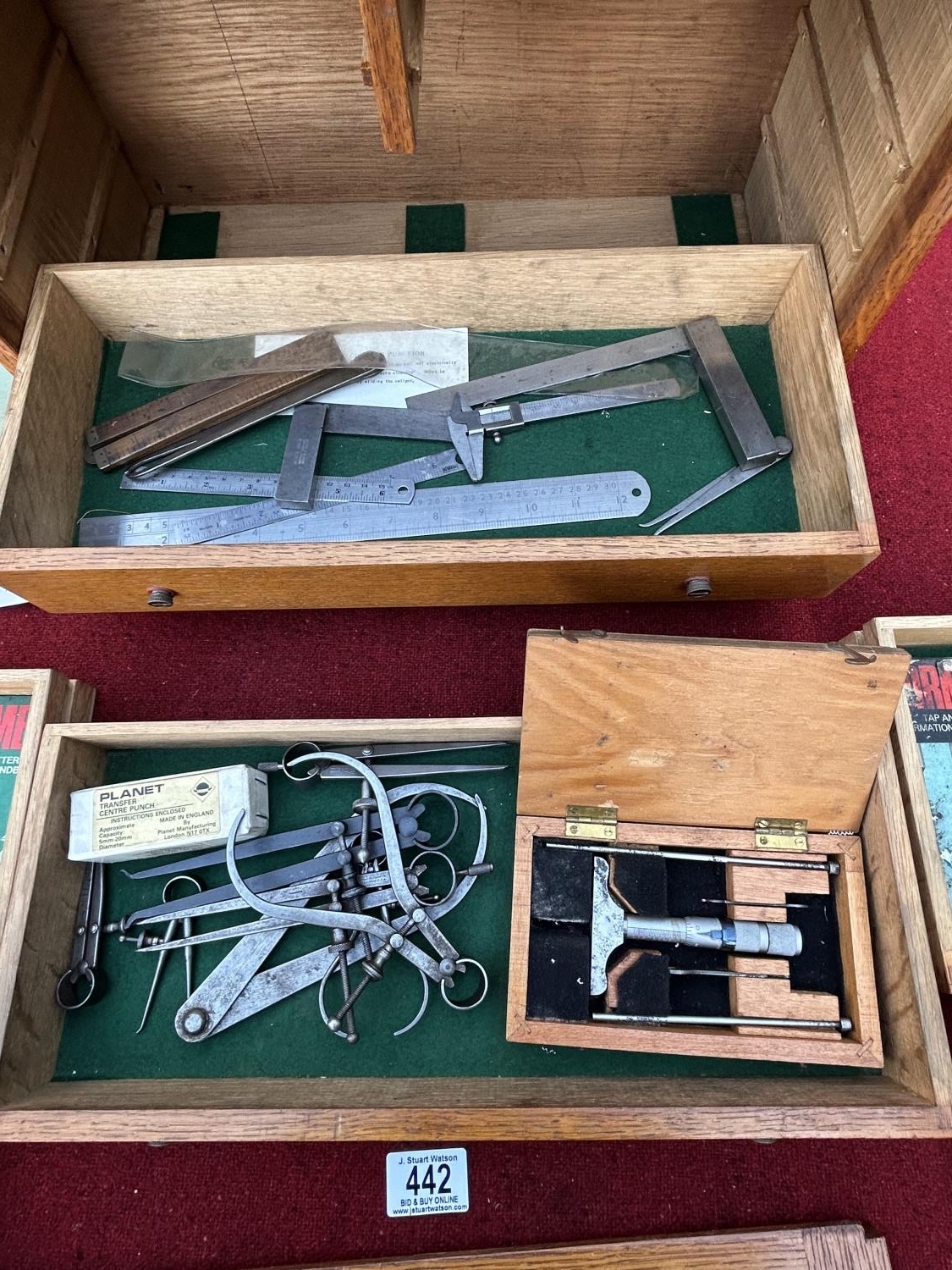 Oak engineers cabinet together with precision engineering tools, and ...