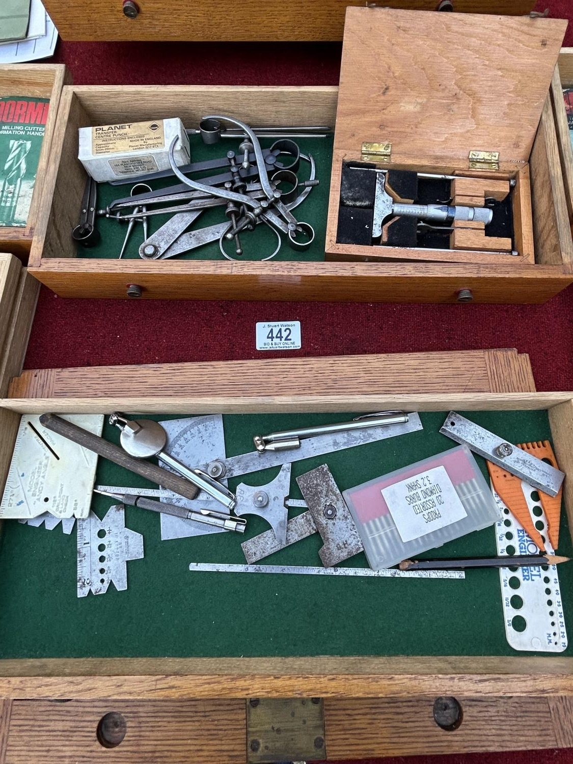 Oak engineers cabinet together with precision engineering tools, and ...