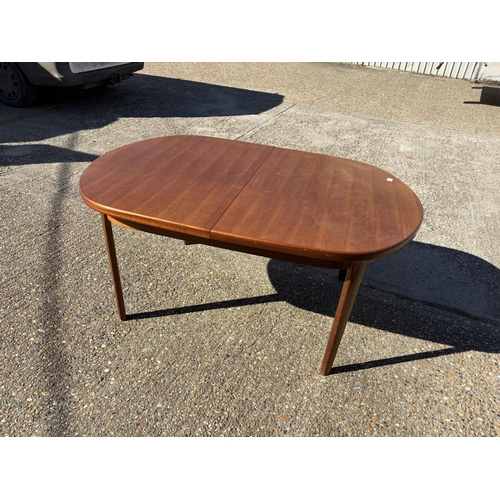 121 - A mid century teak extending dining table max size 109x216