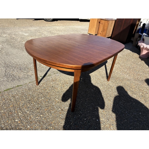 121 - A mid century teak extending dining table max size 109x216