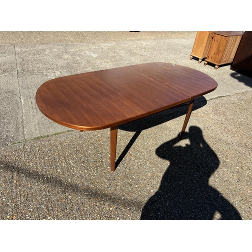 121 - A mid century teak extending dining table max size 109x216