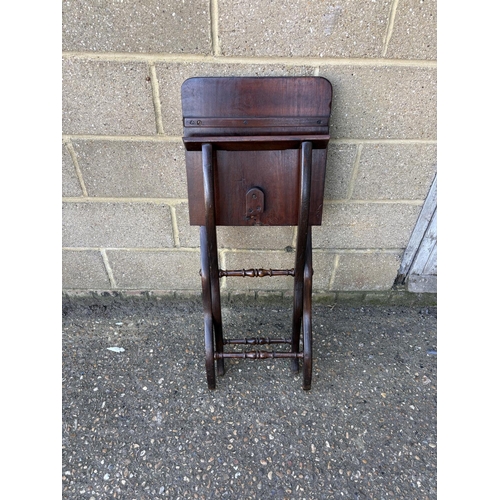 231 - A Victorian mahogany folding campaign style table