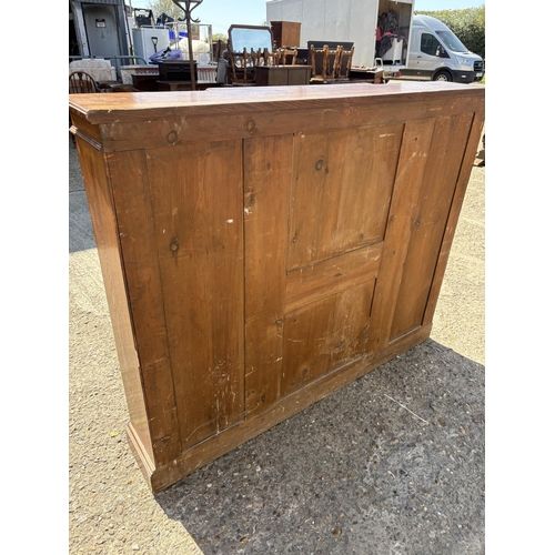 236 - An oak open fronted bookcase with seven adjustable shelves 160x30x130
