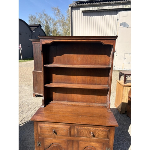 244 - An oak cottage dresser 92x45x175