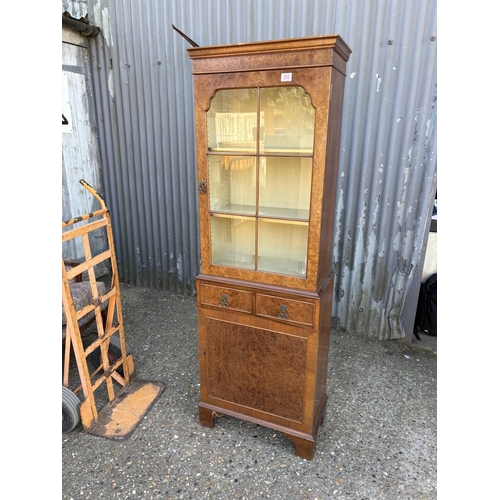 252 - A burr walnut cabinet 56x30x177