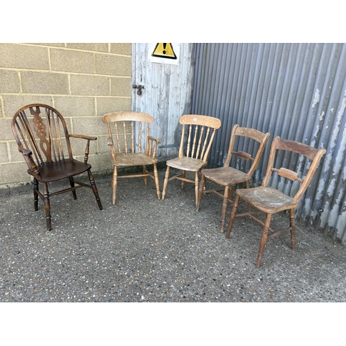 260 - A pair of Windsor chairs, two pine chairs and a wheel back carver