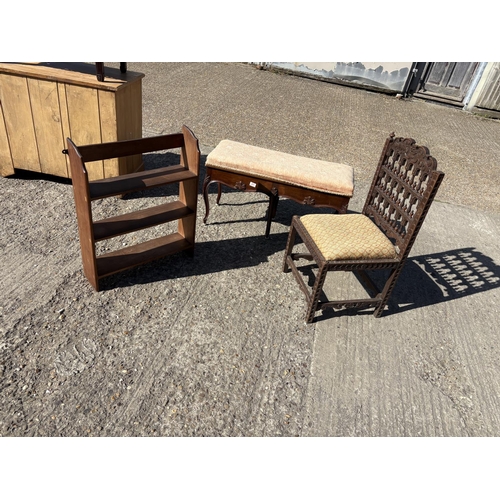 261 - A French mahogany duet piano stool, carved oak chair and a wall shelf