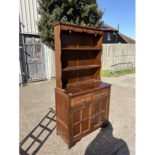 264 - An oak cottage dresser 93x40x175