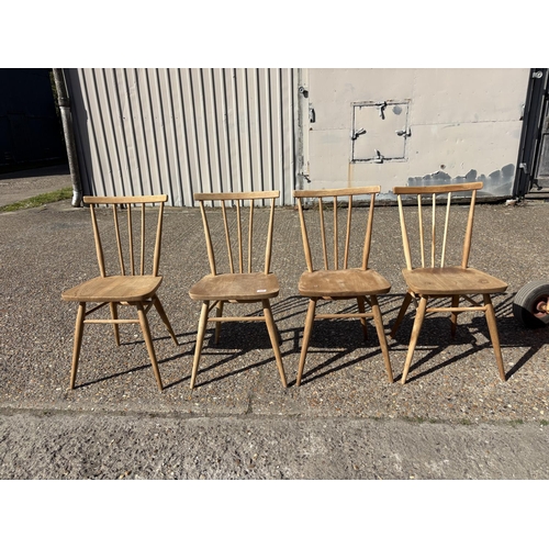 266 - A set of four Ercol stick back chairs