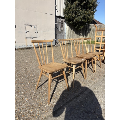 266 - A set of four Ercol stick back chairs