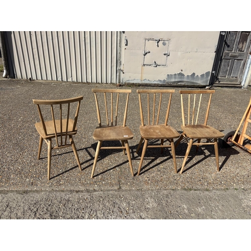 266 - A set of four Ercol stick back chairs