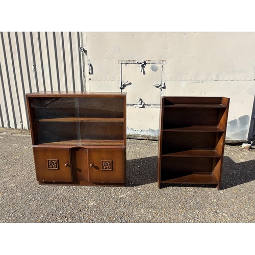 275 - A glazed oak bookcase together with an oak open fronted bookcase