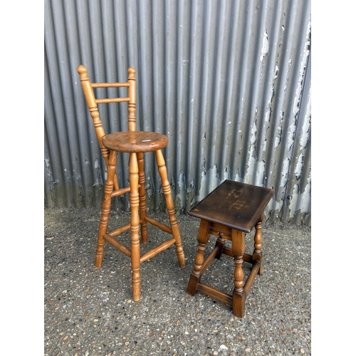 276 - A pine stool, together with a small oak table