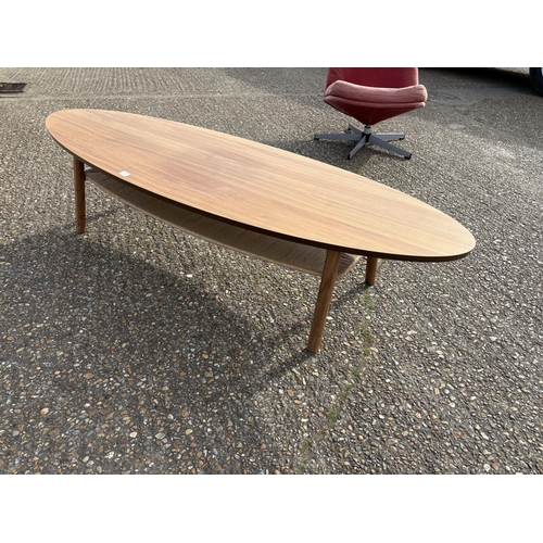 279 - A mid century modern teak effect surfboard coffee table 180x60x40