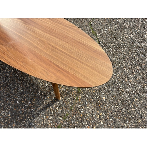 279 - A mid century modern teak effect surfboard coffee table 180x60x40