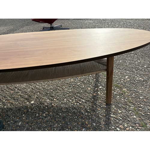 279 - A mid century modern teak effect surfboard coffee table 180x60x40