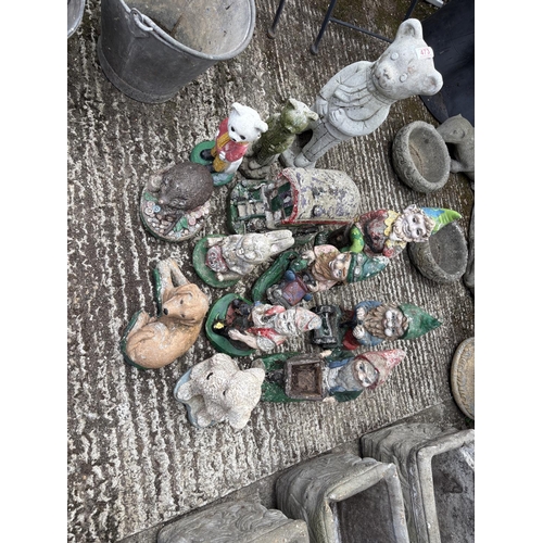 473 - A collection of gnomes and garden figures
