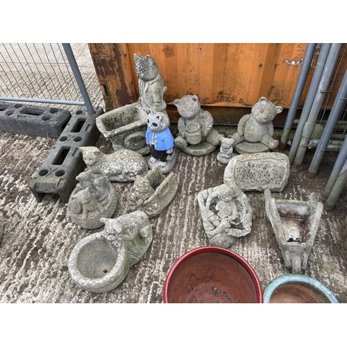 475 - A collection of assorted concrete figures and novelty statues