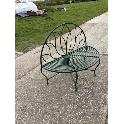 479 - A green painted metal garden bench seat 120cm wide