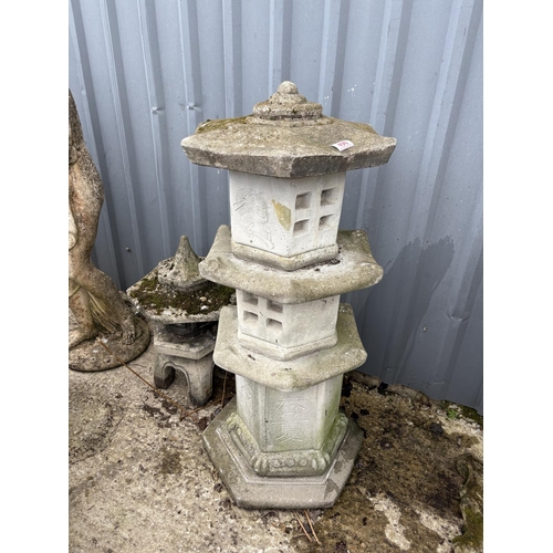 496 - Two concrete Pagoda ornaments, tallest 100 cms