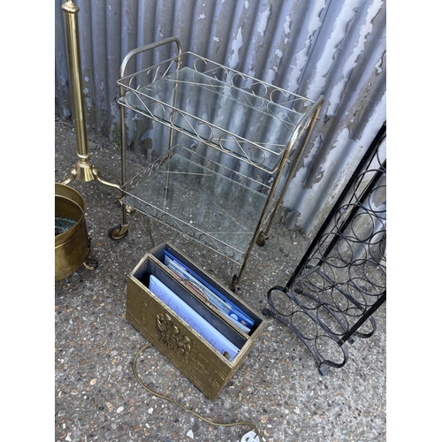 54 - Brass standard lamp, retro trolley, wine rack, brass planter and paper rack